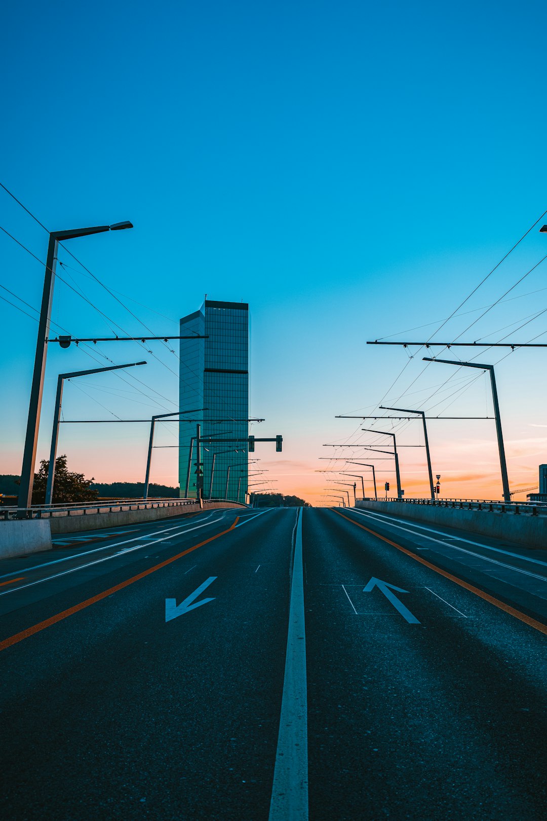 gray concrete road with no cars during daytime