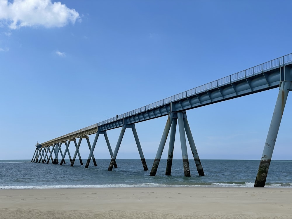 gray wooden dock on sea during daytime