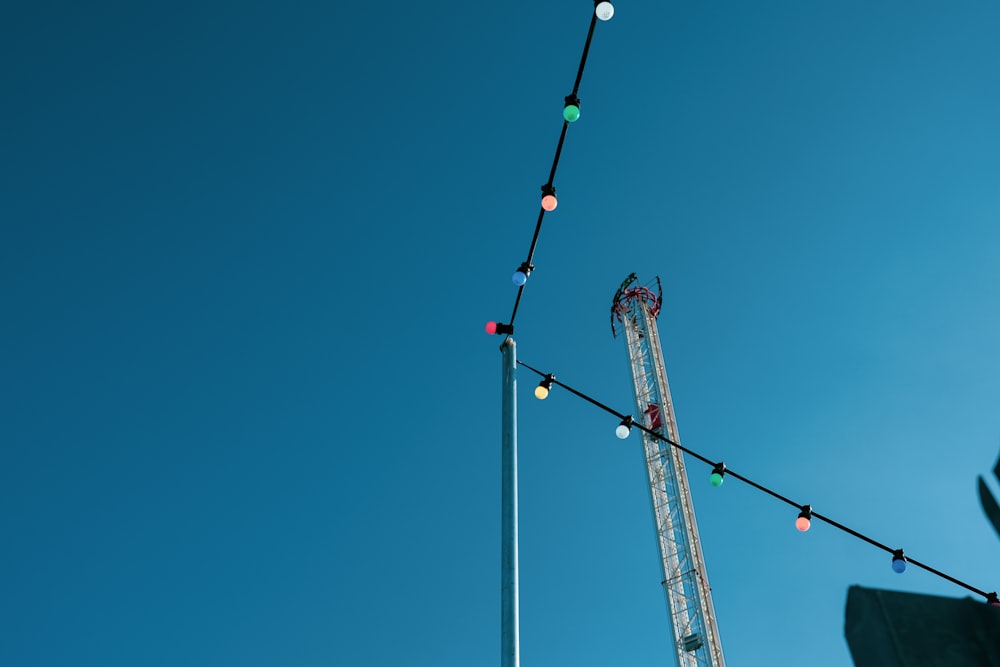 red and black cable cars under blue sky during daytime