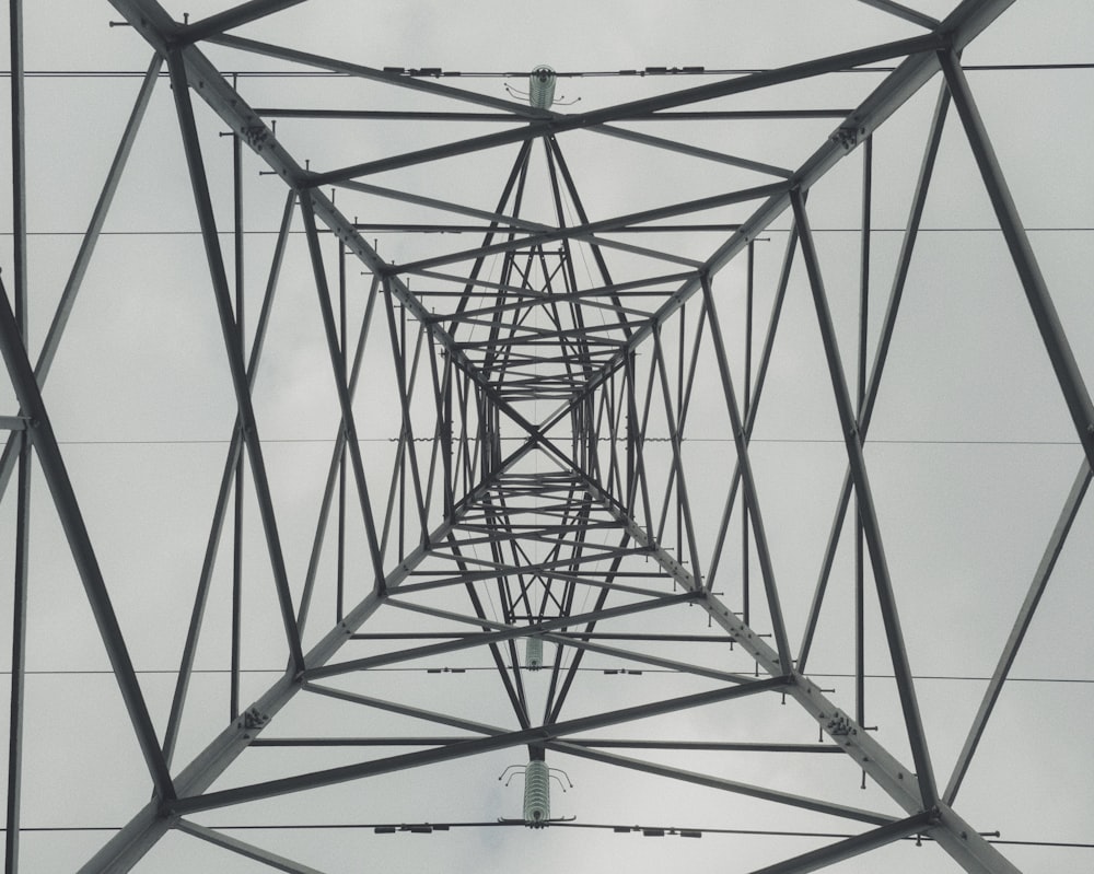 gray metal tower under gray sky