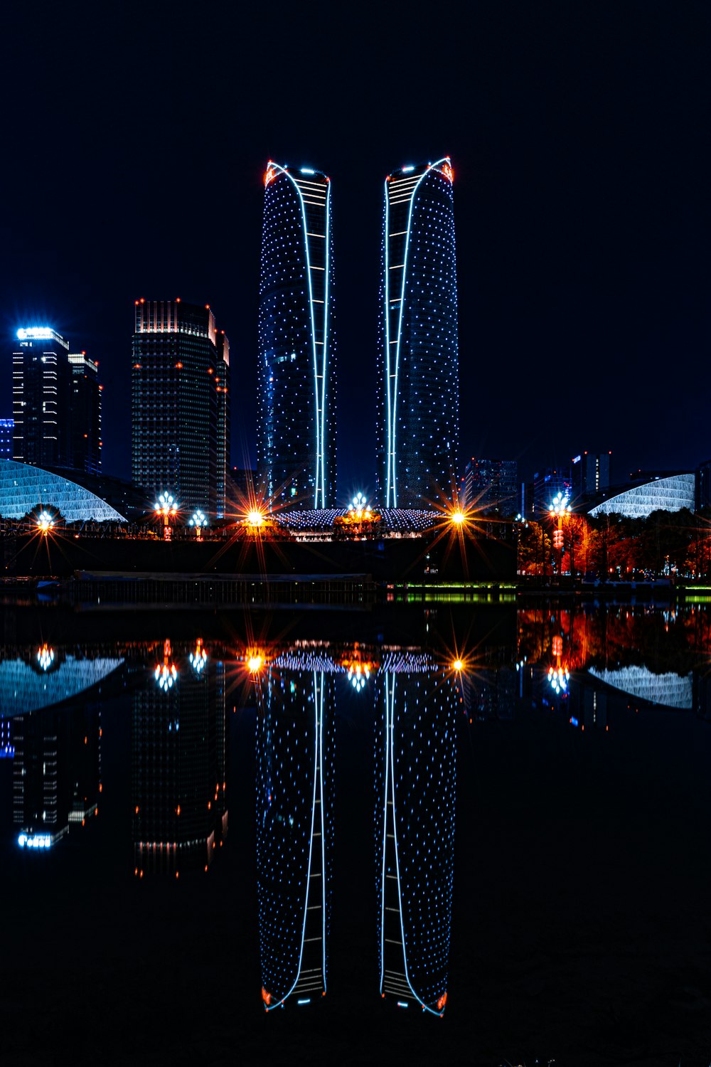 city skyline during night time