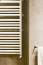 white wooden window frame near white wall
