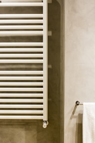 white wooden window frame near white wall