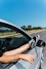person driving car during daytime