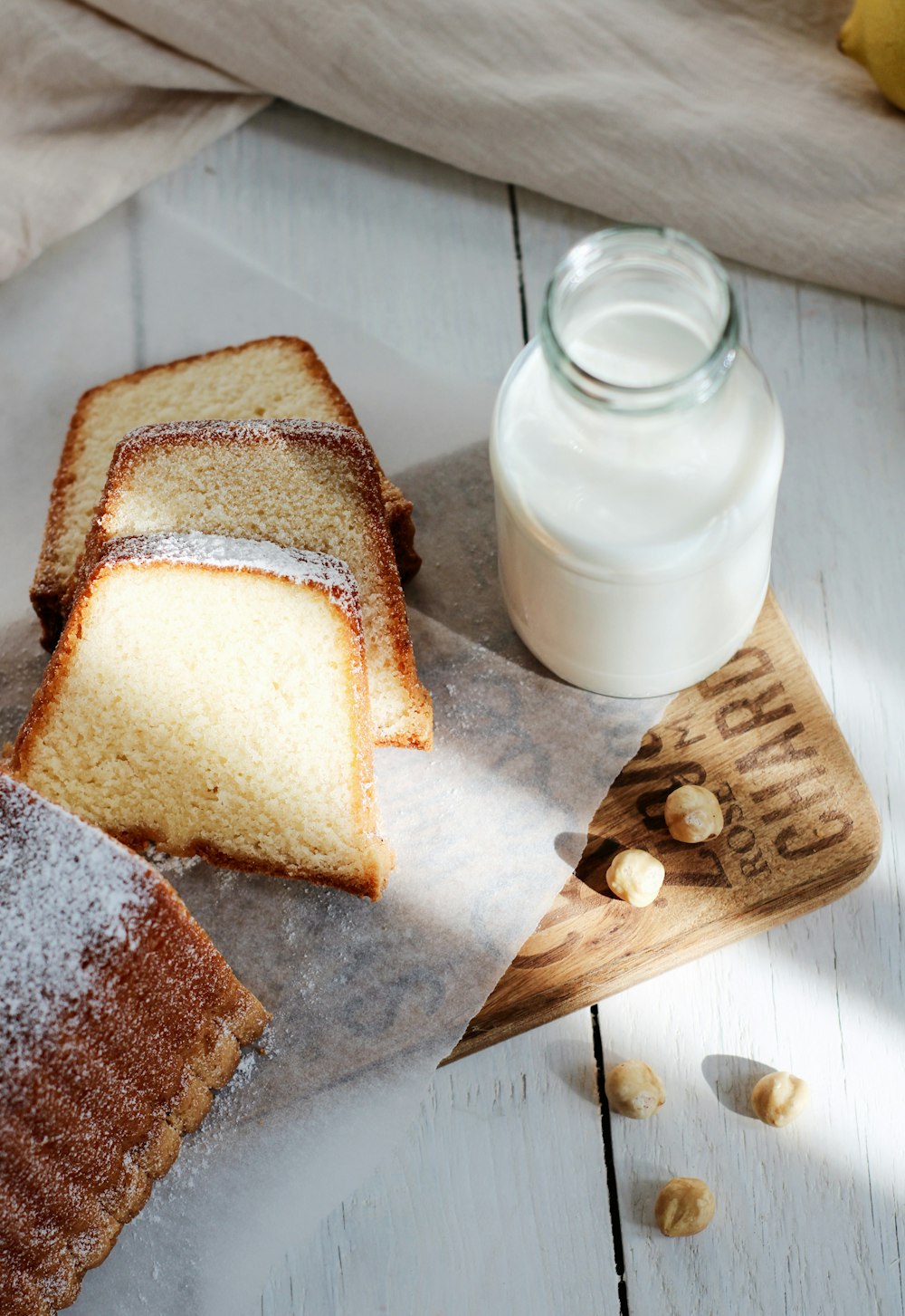 sliced bread on brown wooden chopping board