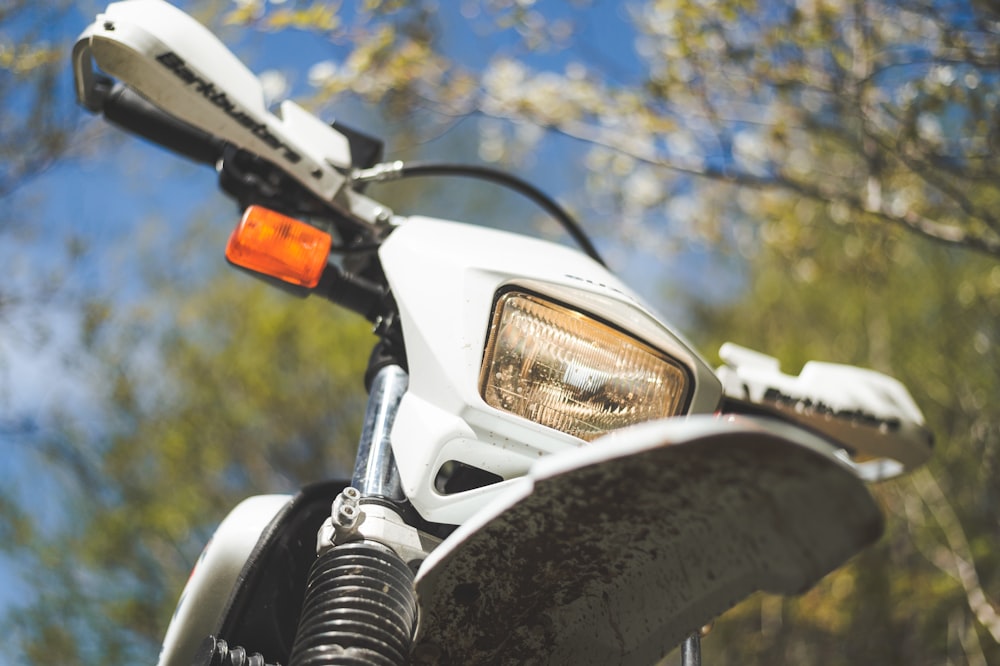 black motorcycle with orange light