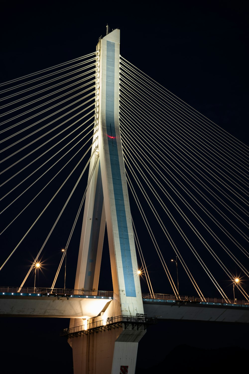 white bridge during night time