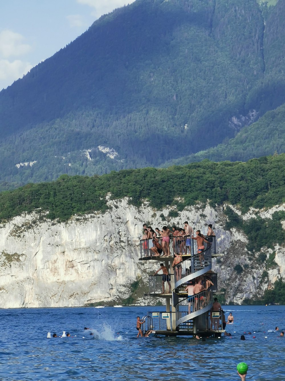 people riding on boat on sea during daytime