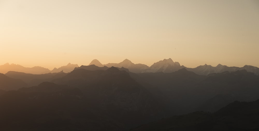 silhouette of mountains during daytime