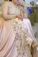 woman in beige floral dress