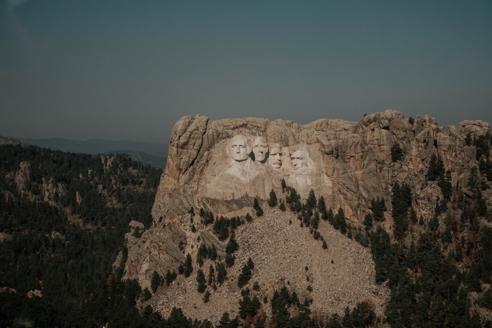 brown rock formation under blue sky during daytime