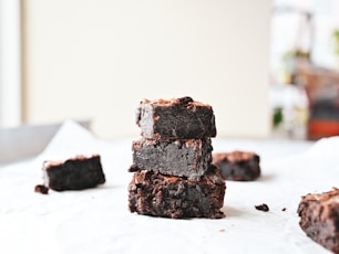 brown and black chocolate cake on white table