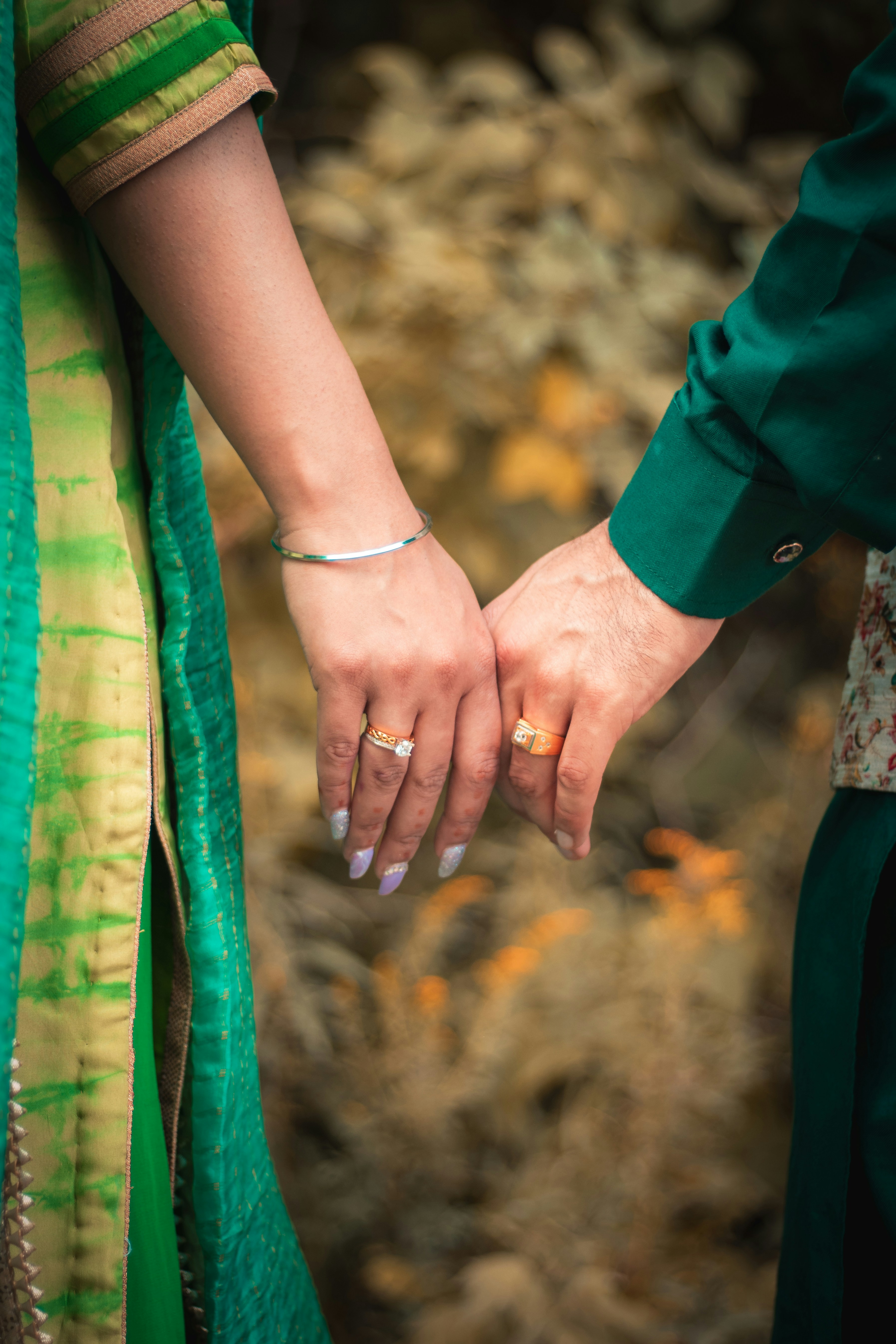 person in silver bracelet and silver bracelet