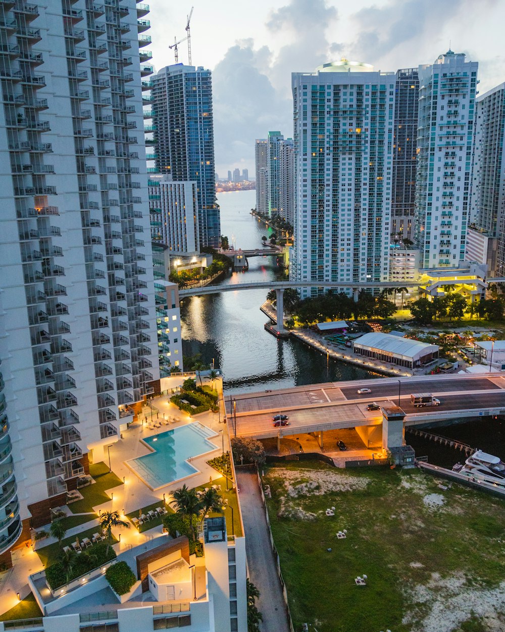 high rise buildings near river during daytime