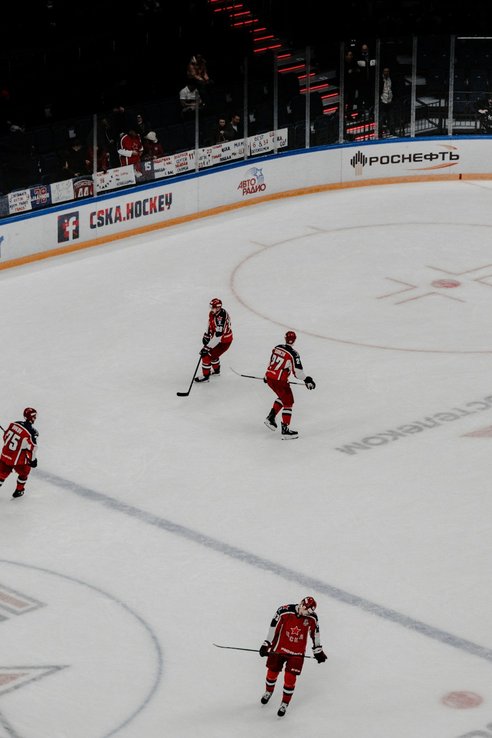 2 men playing ice hockey