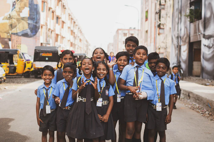 A group of people gathered on an Indian street