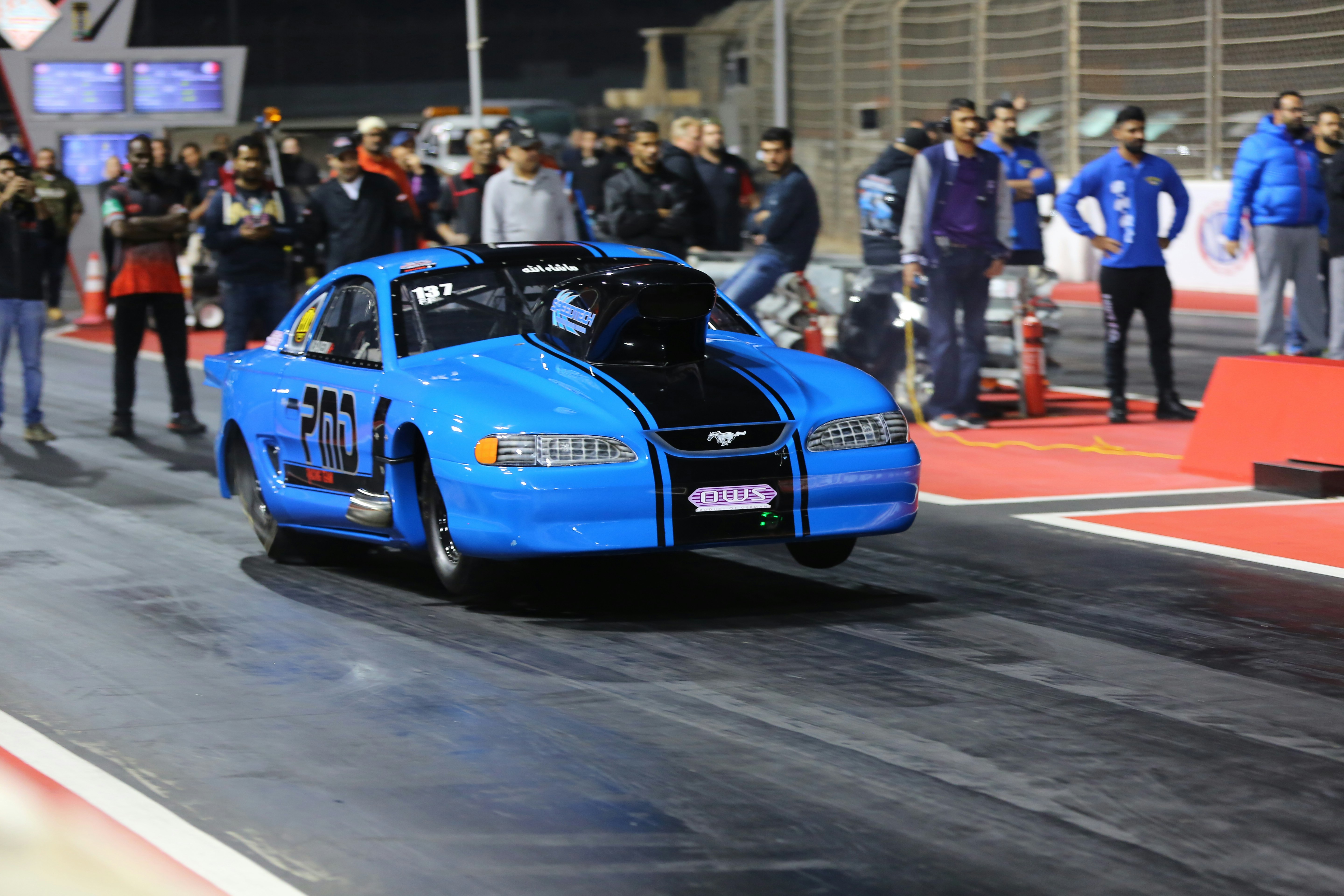 blue porsche 911 on track