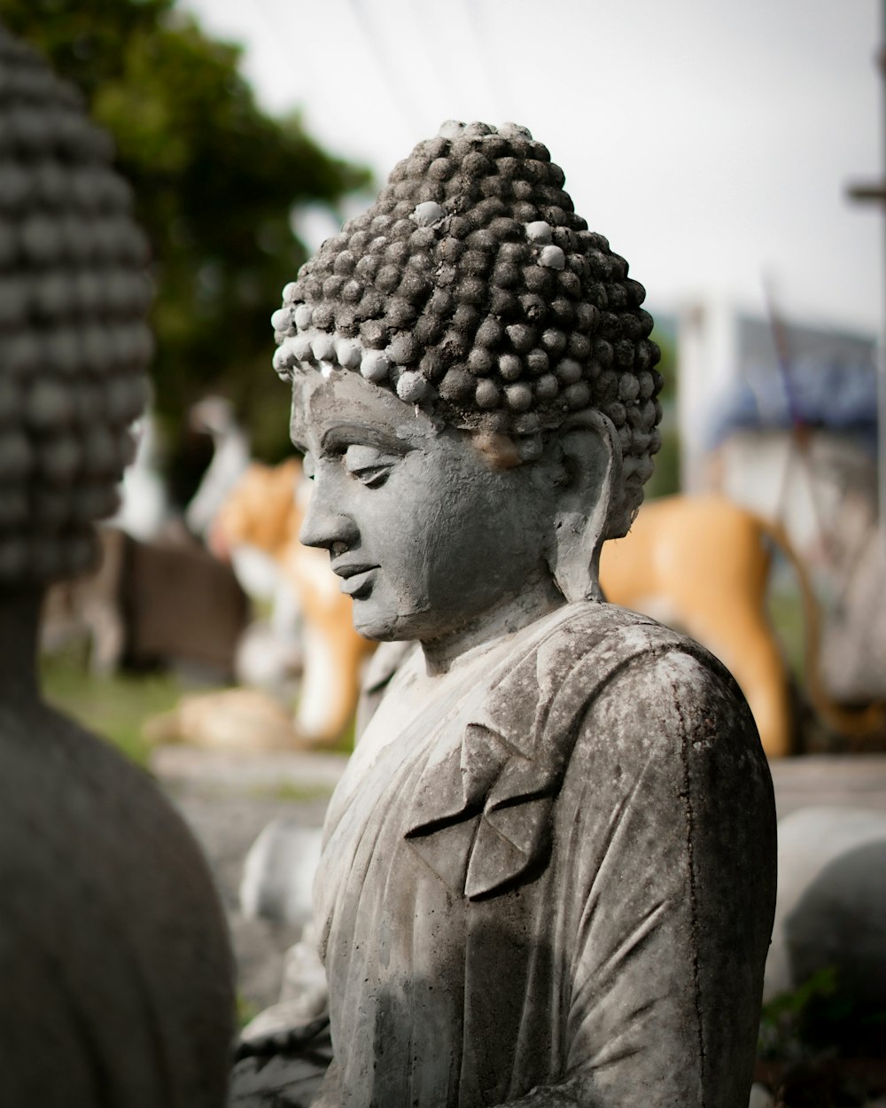 black concrete statue of man