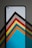A close-up of a smartphone displaying a vibrant newsletter with geometric shapes.
