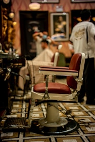 brown and white leather barber chair