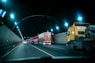 yellow truck on road during nighttime