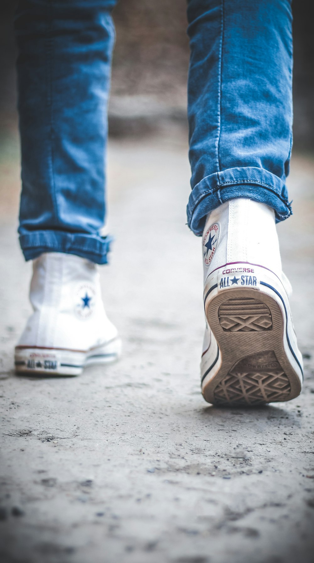 person wearing white converse all star high top sneakers photo – Free Image  on Unsplash