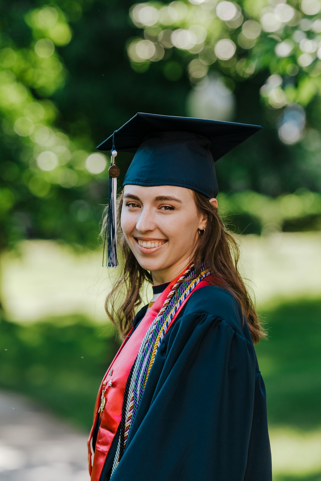 smiling woman in academic dress