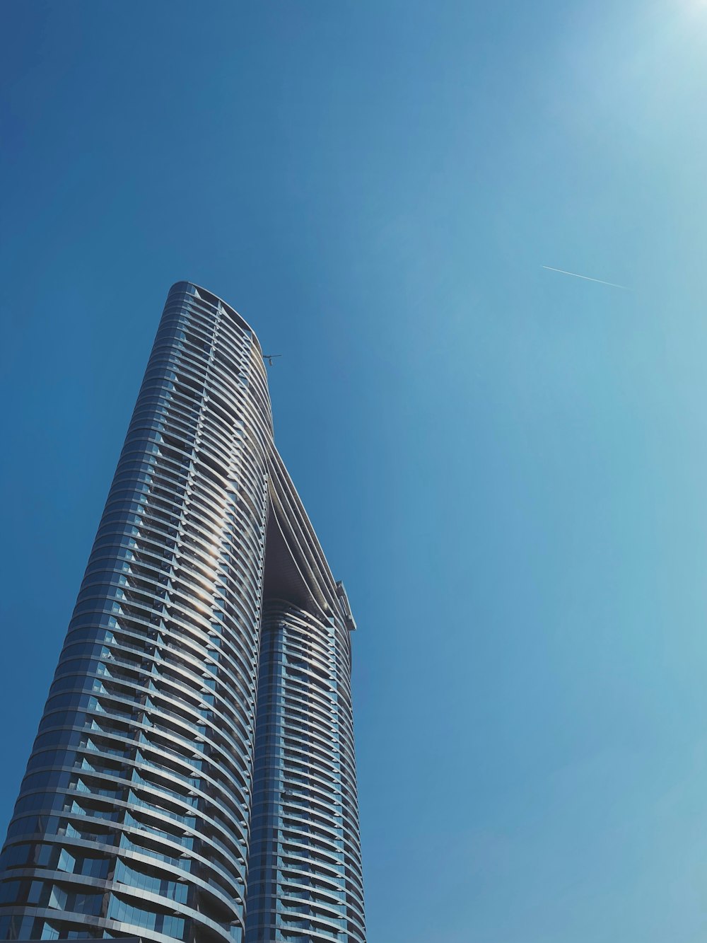 gray concrete building under blue sky during daytime