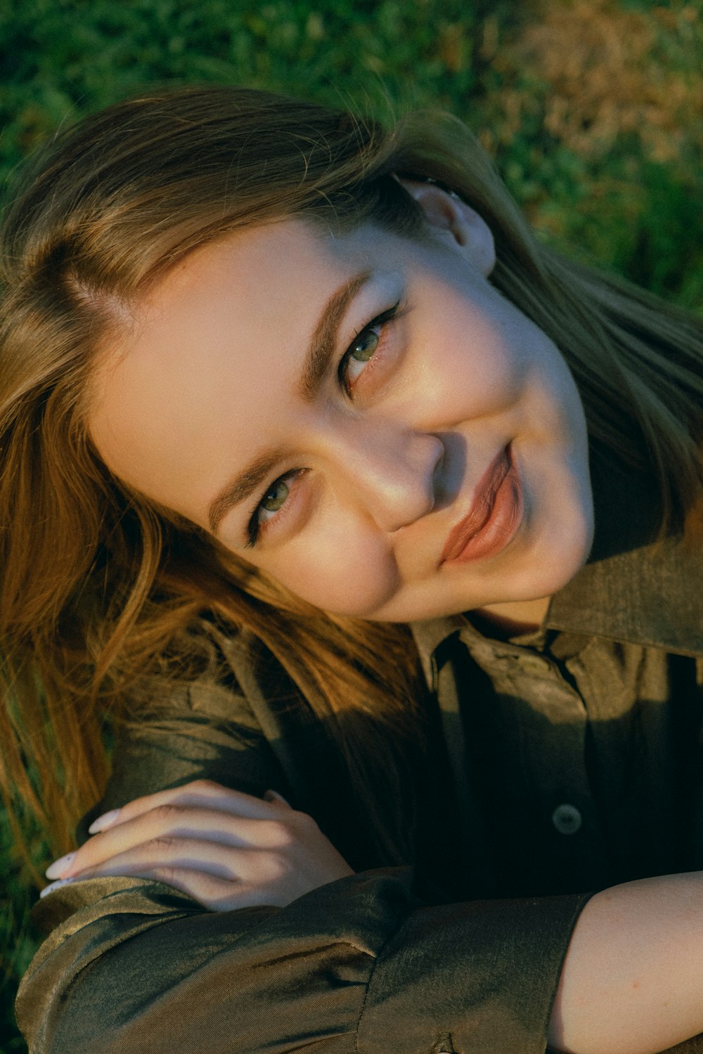 woman in black jacket smiling