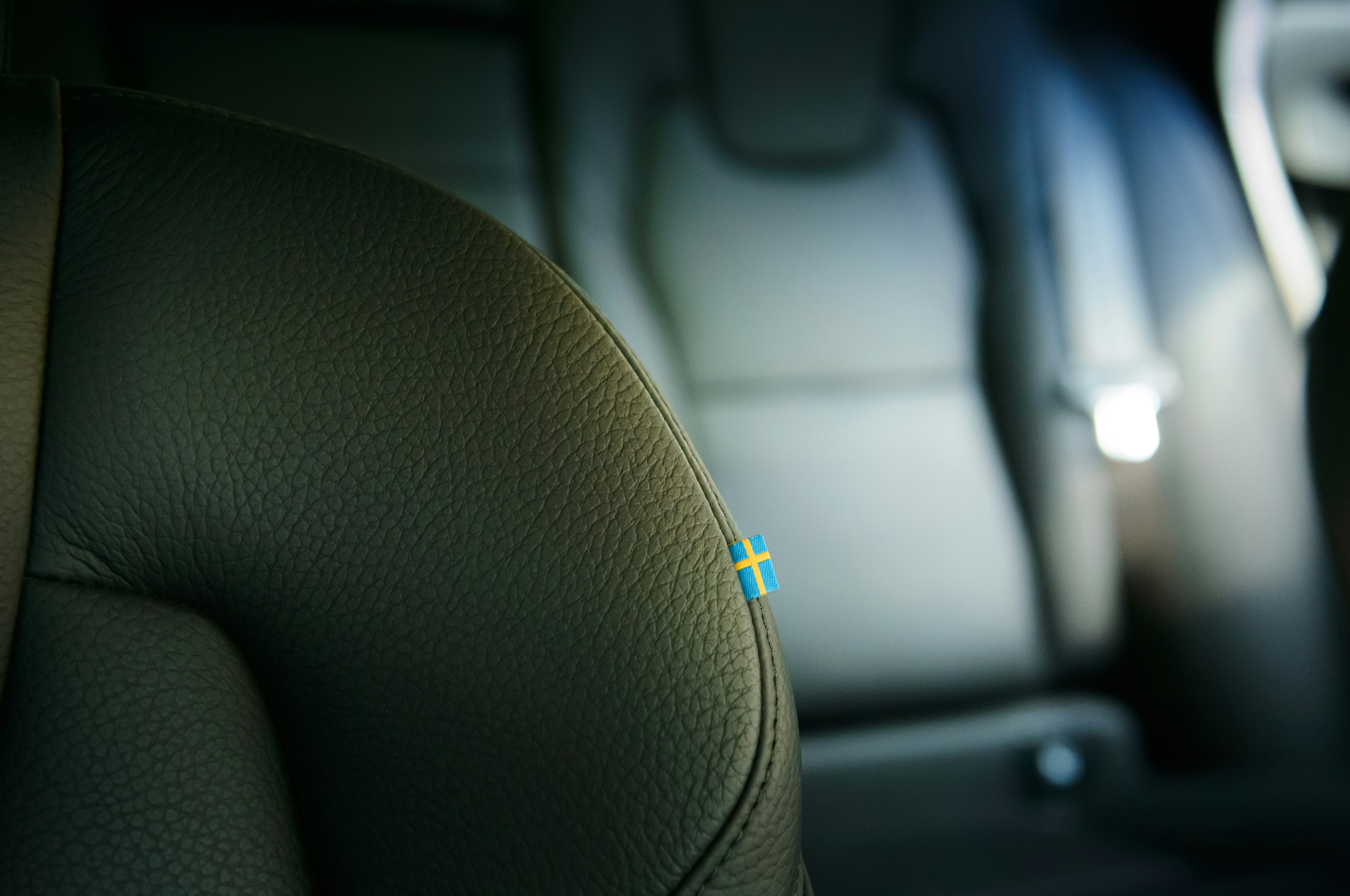 blue and white usb cable on car seat