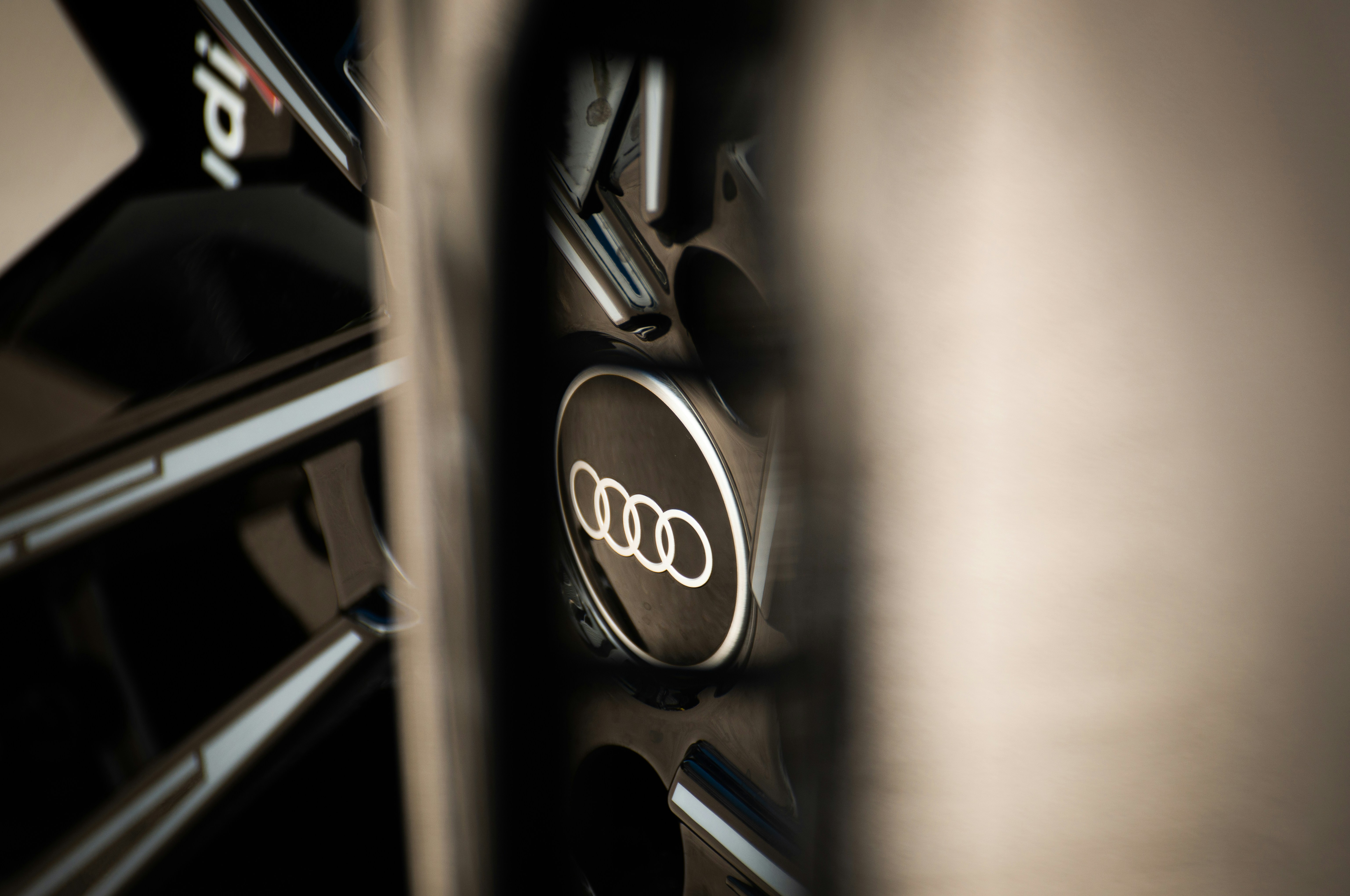 Audi four rings logo symbolizing unity and innovation