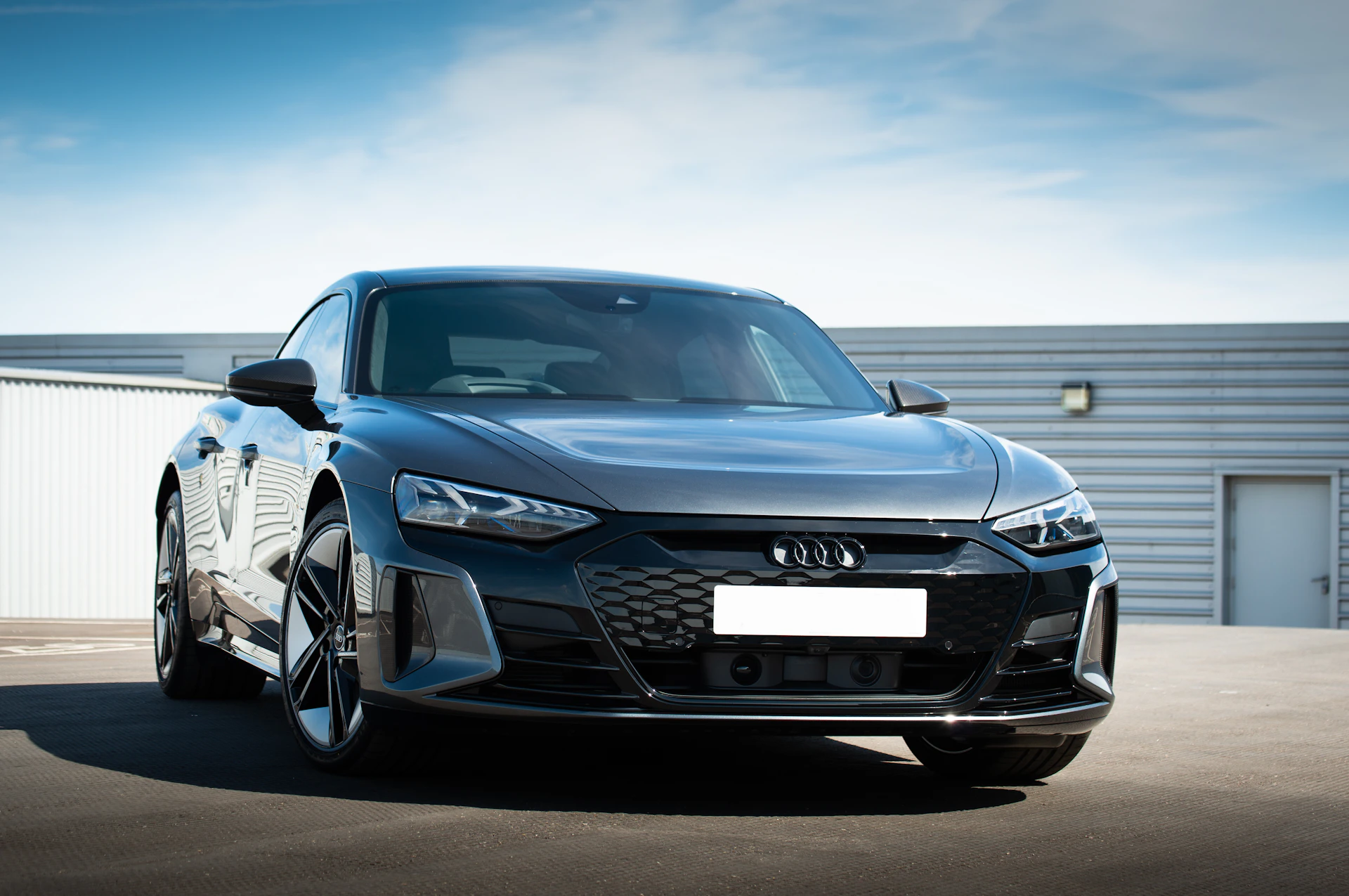 black audi a 4 on road during daytime