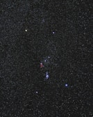 A vibrant photo of a colorful zodiac wheel with star constellations.