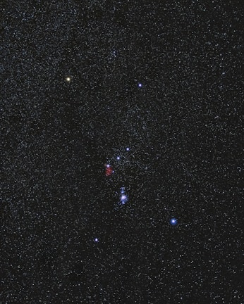 A vibrant photo of a colorful zodiac wheel with star constellations.