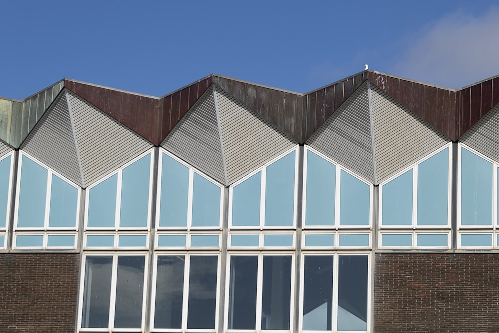 white and brown building under blue sky during daytime