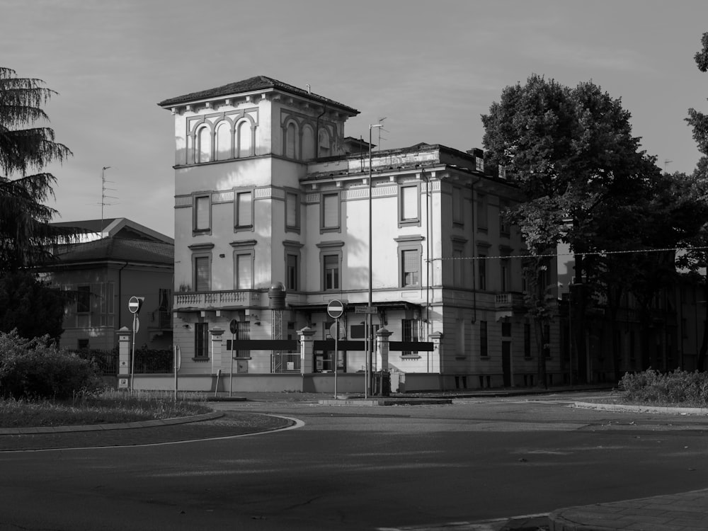 grayscale photo of 2 storey building