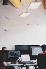 A modern office space with aviation professionals collaborating.