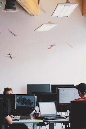 An office scene representing HTI as the parent company coordinating operations.