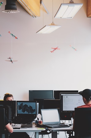 An office environment showcasing employees using cloud technology.