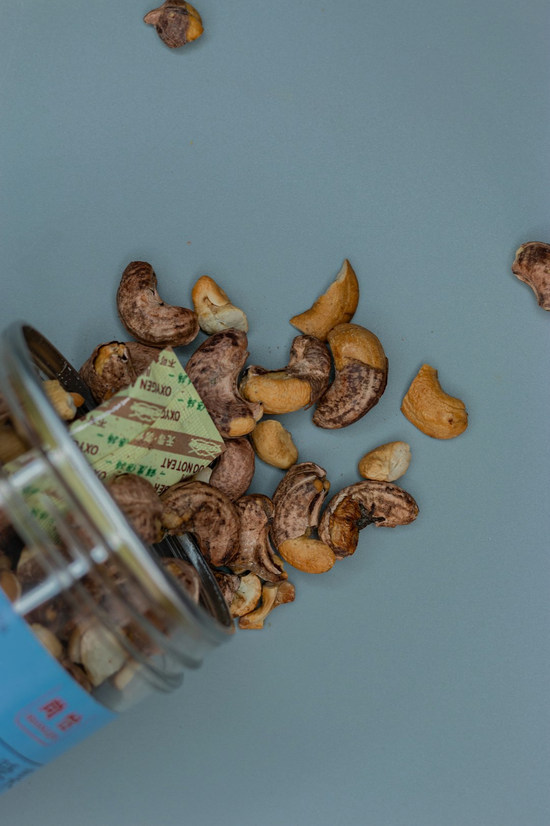 almond nuts on clear glass jar