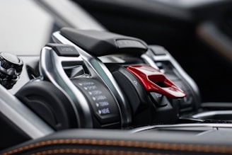 black and red car steering wheel