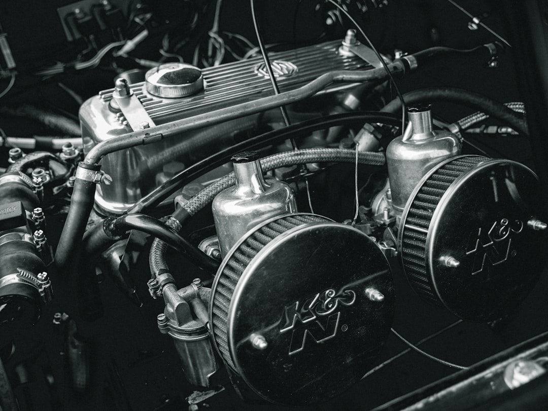 black and silver motorcycle engine,