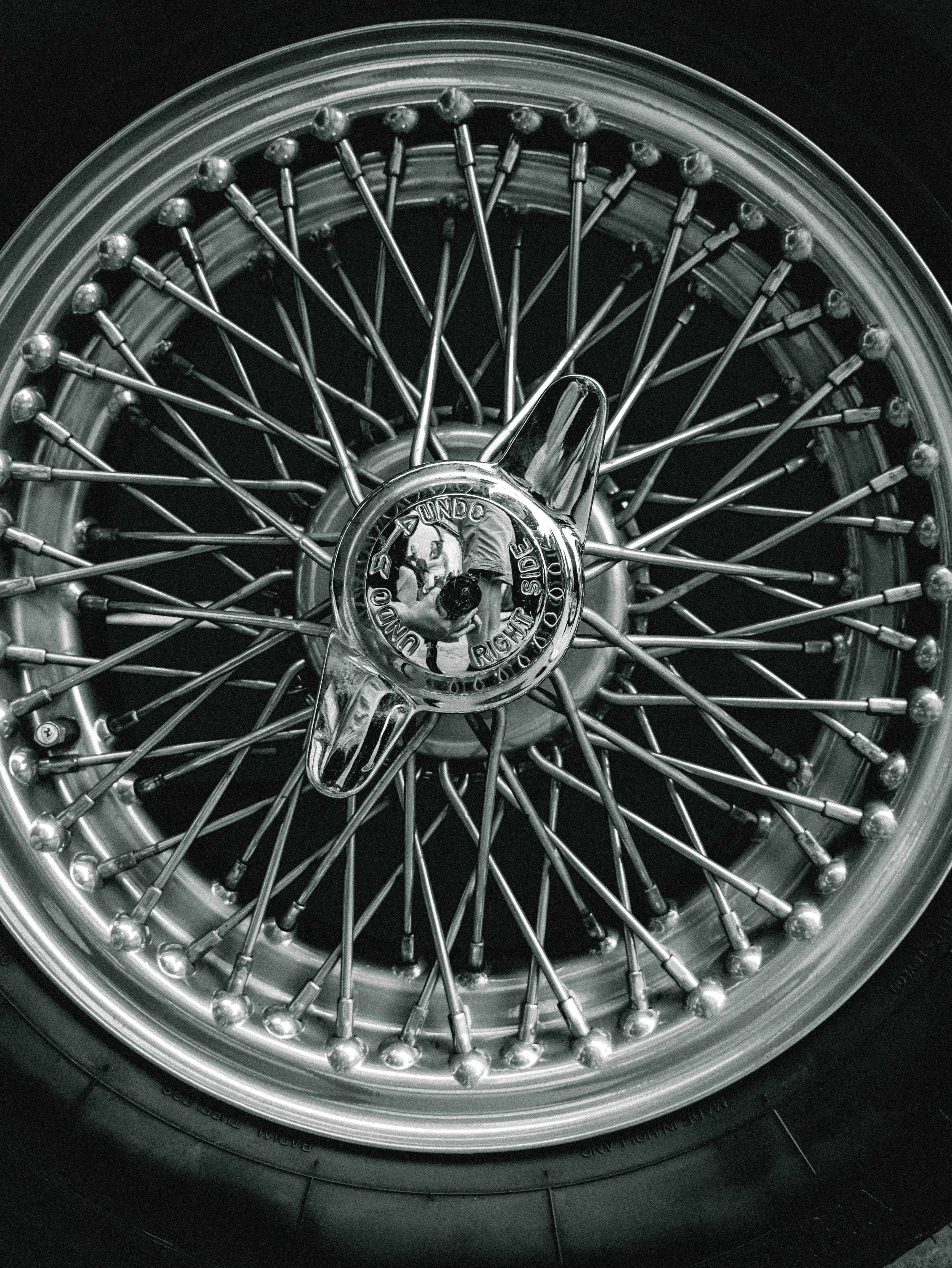 silver multi spoke wheel with tire
