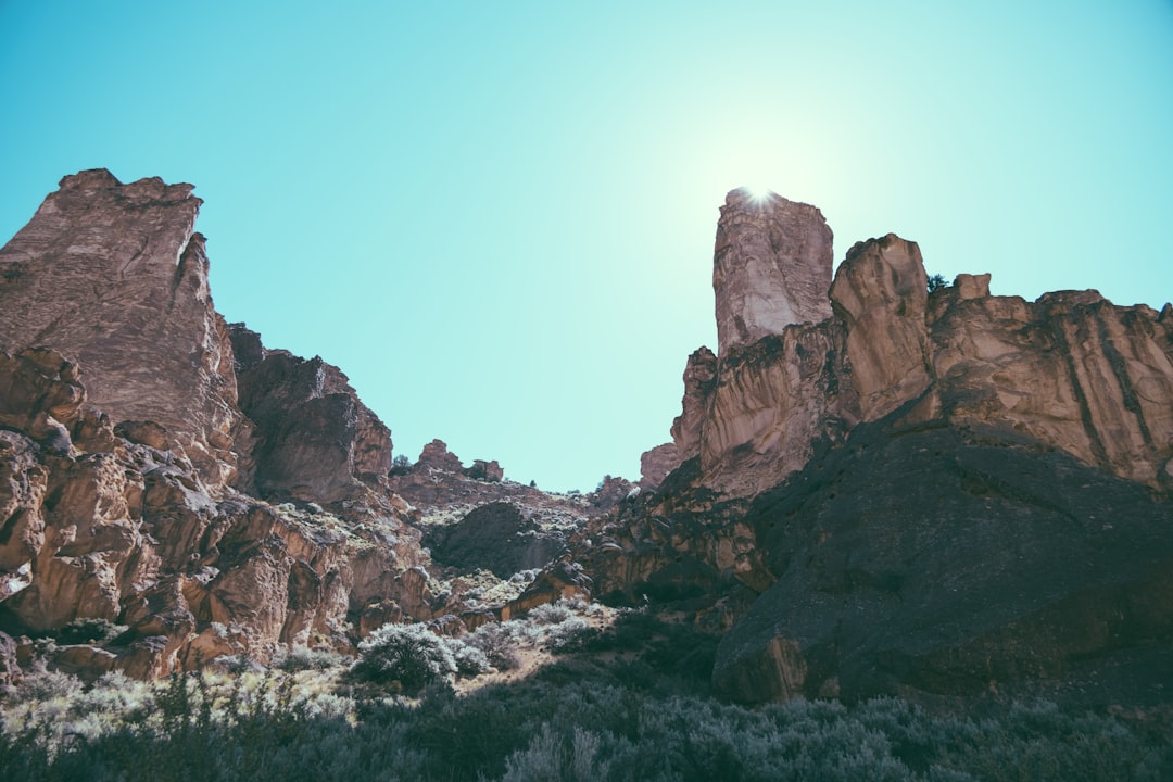 brown rocky mountain under blue sky during daytime