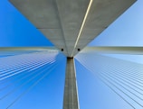 white bridge under blue sky during daytime
