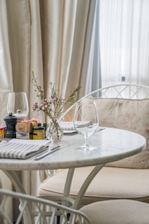 clear drinking glass on white table