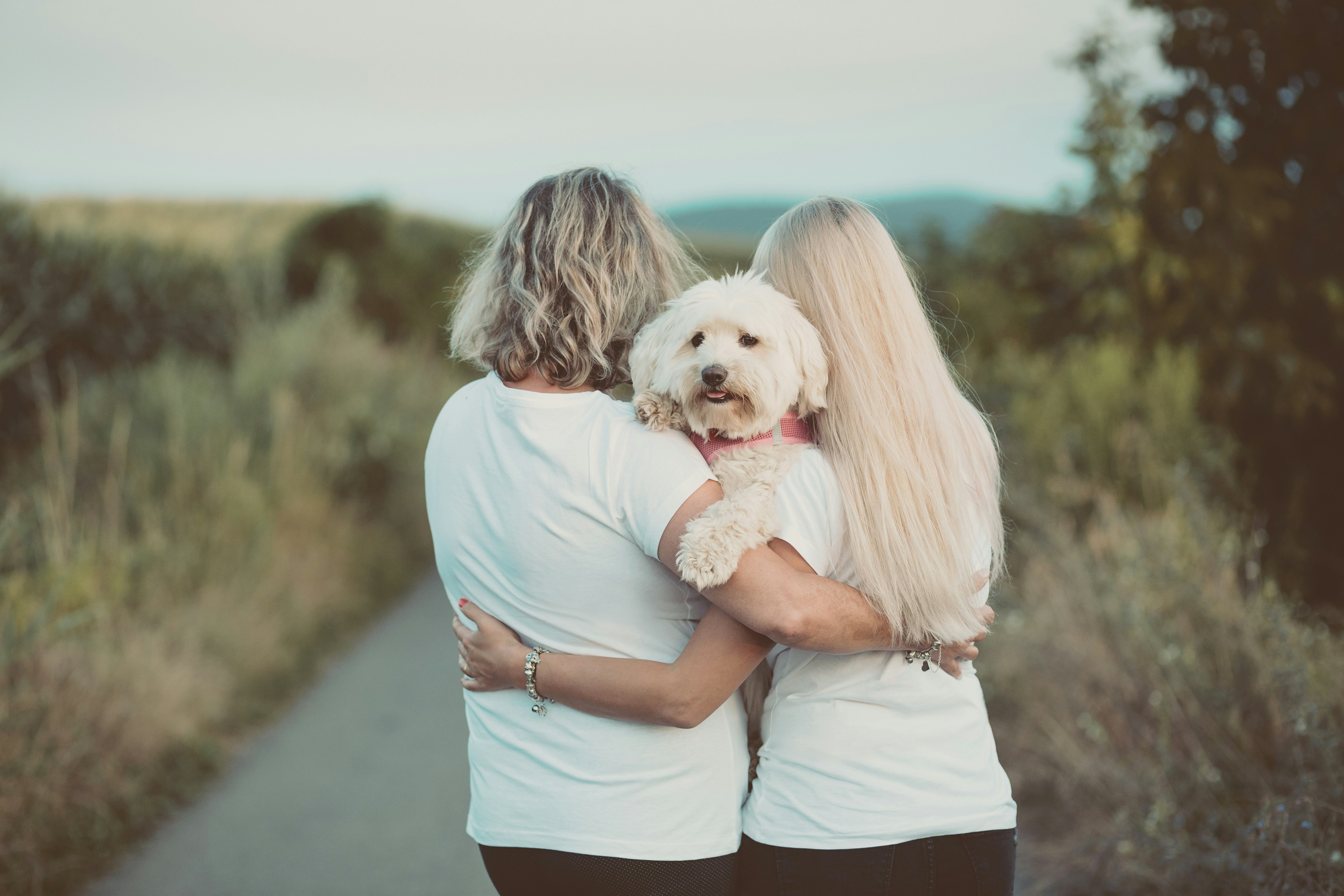 Mother, daughter and dog