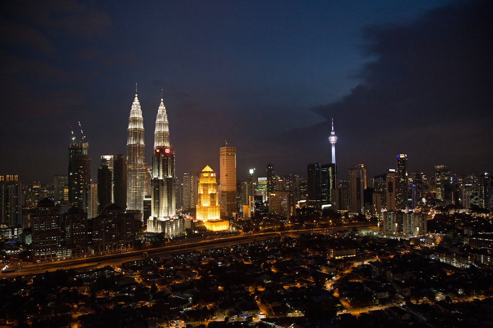 city skyline during night time