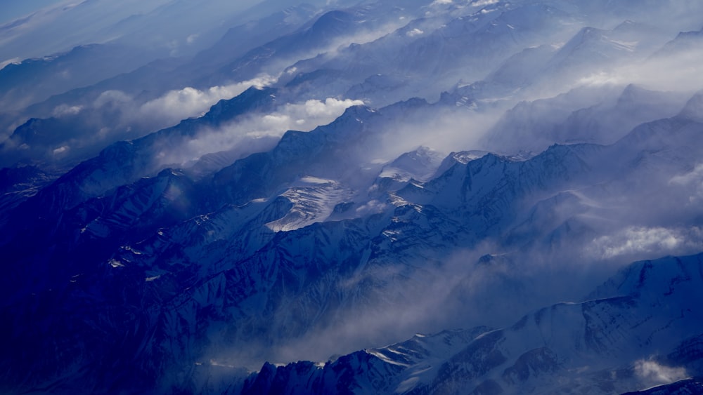 snow covered mountains during daytime