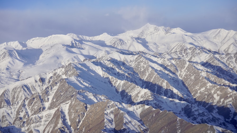 snow covered mountains during daytime